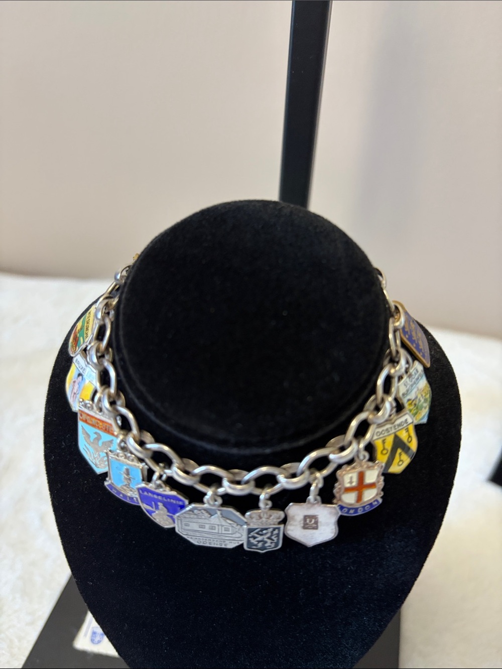 Vintage Swiss Charm Bracelet. Many marked sterling / silver